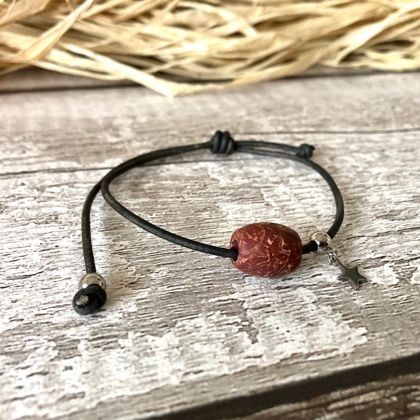 Red Picasso Jasper on leather cord bracelet