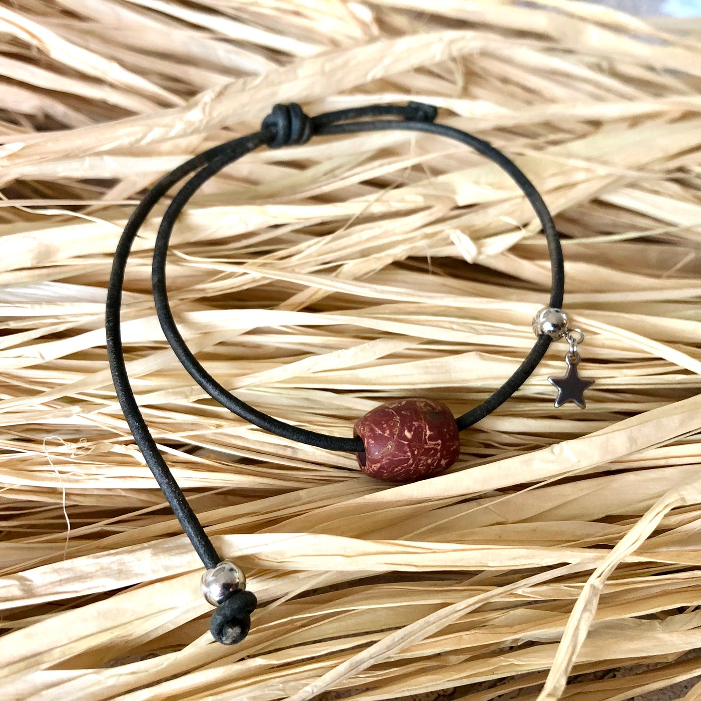 Red Picasso Jasper on leather cord bracelet