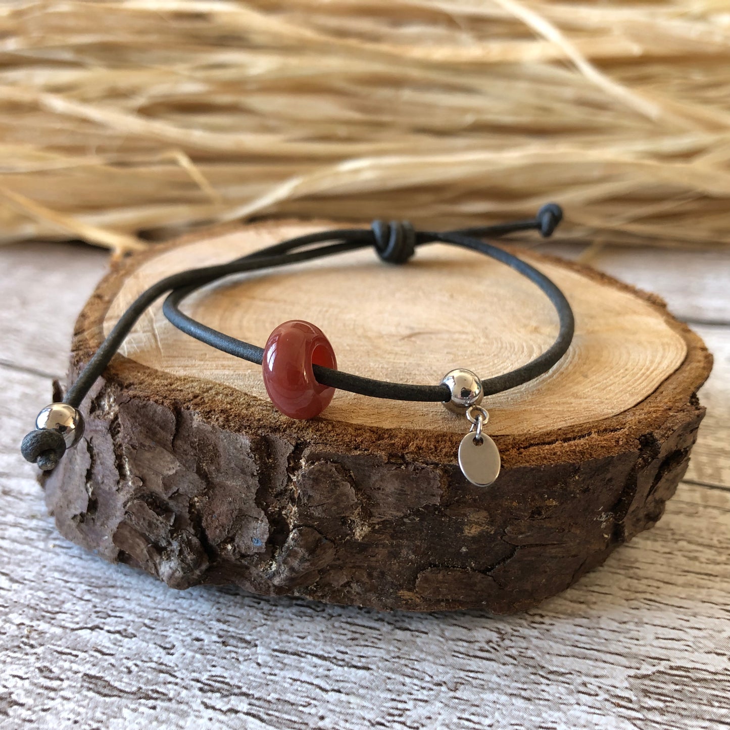 Red Indian Agate on leather cord bracelet